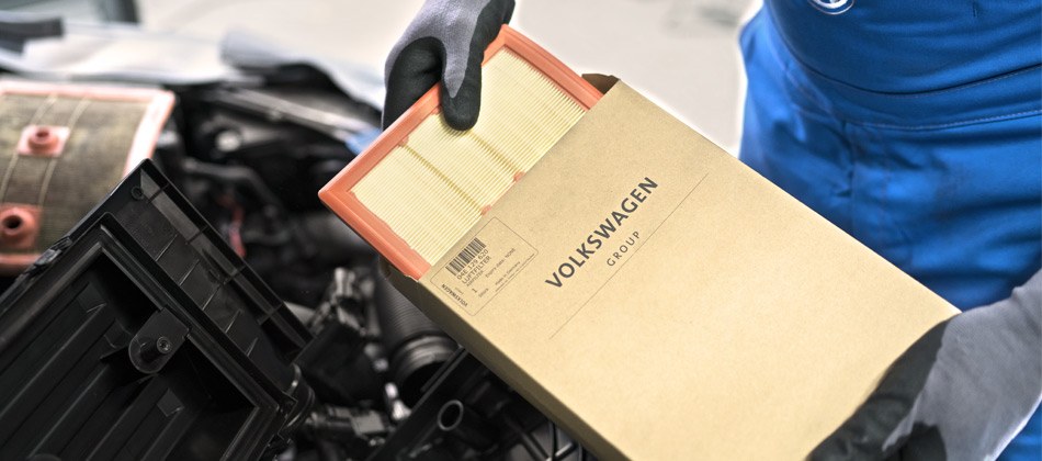 Genuine Volkswagen air filter being removed from the box