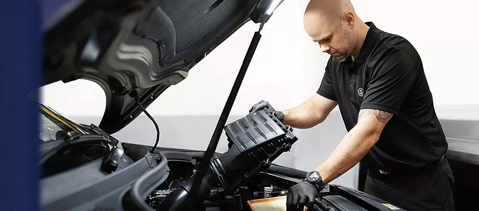 Volkswagen tech inspected an engine