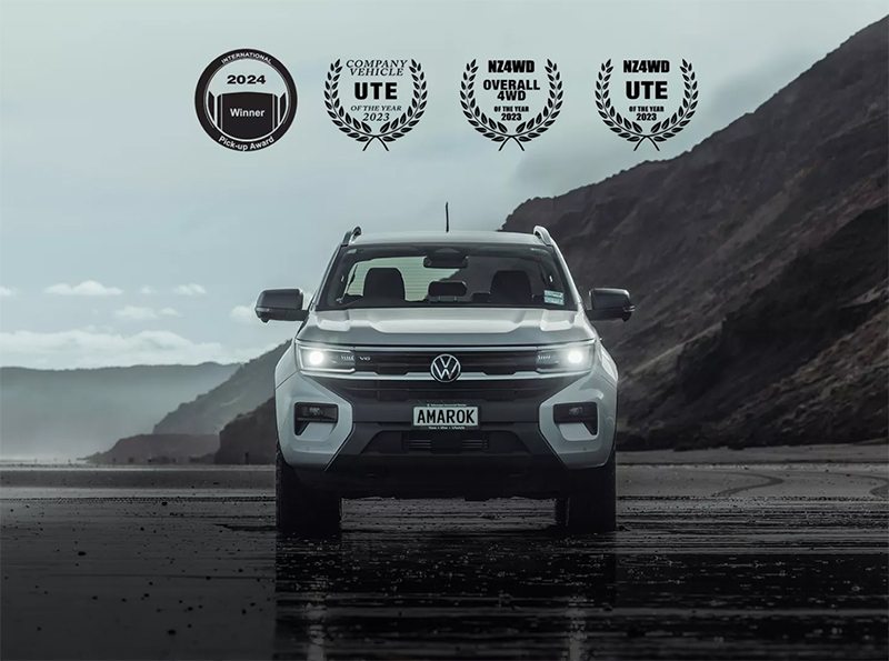 Front shot of an Amarok with award images above