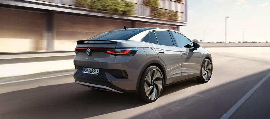 Silver electric SUV driving on a road