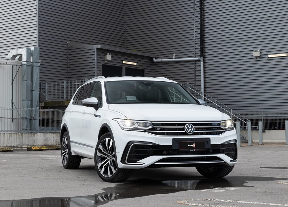 White SUV parked in a roof carpark